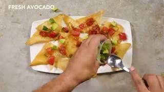 Pick apart the poke nachos - marinated raw ahi, avocado, cilantro,
serranos, green onions, nori, sweet soy, sesame seeds, sriracha aioli,
white truffle sauce...