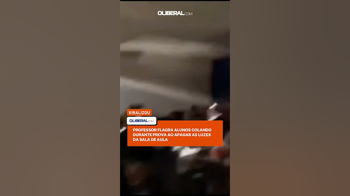 PROFESSOR FLAGRA ALUNOS COLANDO DURANTE PROVA AO APAGAR AS LUZES DA SALA DE AULA