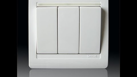 Horizontal switch panel packaging system for wall switch wrapping machine