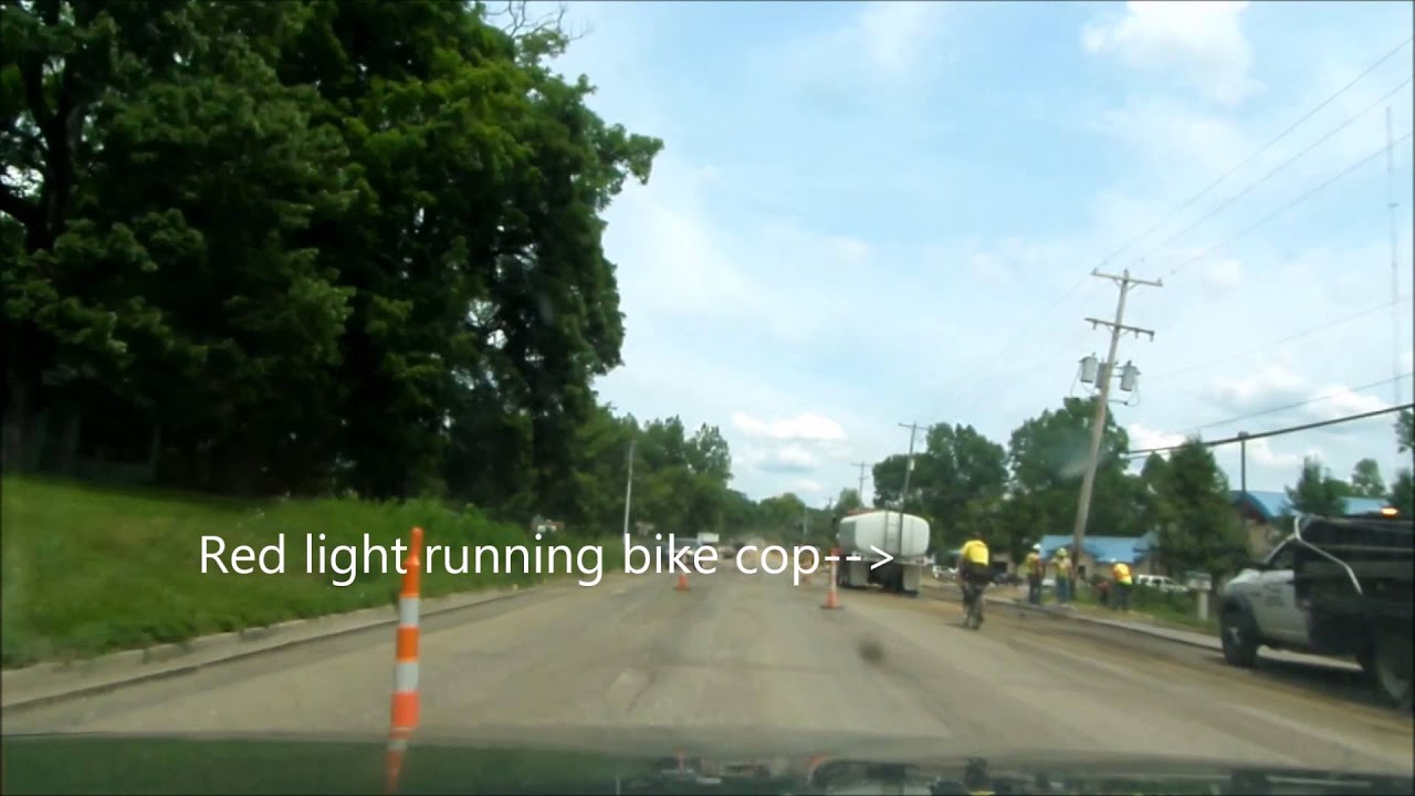 Bike Cop Runs Red Light JacksonCopBlock