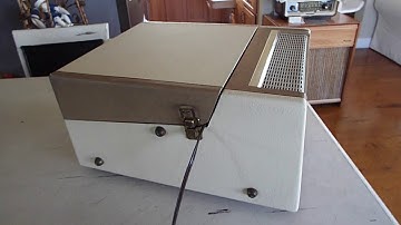 Webcor record player playing a 45 RPM record