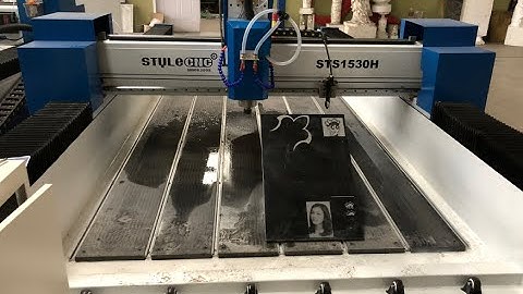 Multi-purpose stone CNC machine with a laser head for craving and engraving on stone