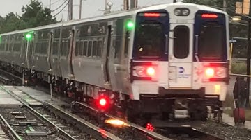 LIRR M9 Departs Deer Park on a Cold Rainy Afternoon With Sparks Flying From the Wet 3rd Rail
