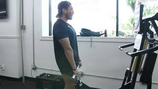 Coach Mike demoing deadlifts on the Keiser Functional Trainer 3020 at Different Breed Sports Academy