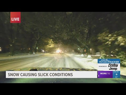 Thursday snow causing slick road conditions around Spokane - YouTube