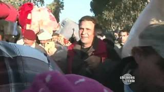 Tunisia takes on Libya's refugees