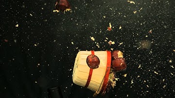 Slow Motion Exploding Basket of Apples