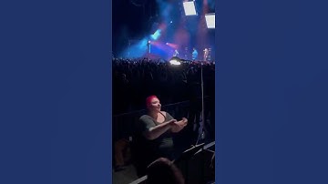 The most metal sign language interpreter doing an incredible job at the Korn show 🤘