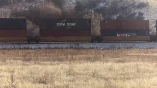 Stack train at milepost 989 led by AC44 7097 in Riverdale Utah