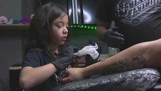 An 8-year-old tattoo artist is making a name for herself