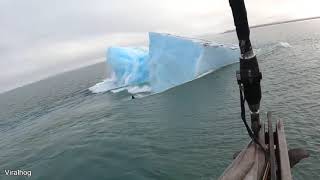 Man climb on a giant iceberg!!! ( internet compilation )