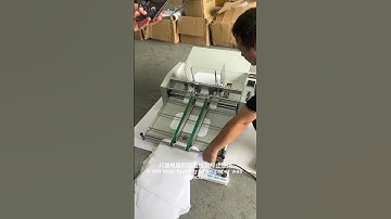 Smooth paper feeding machine, saving one labor cost