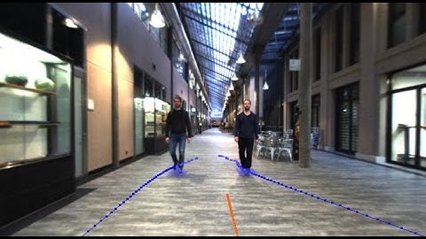 Predicting Actions to Act Predictably: Cooperative Partial Motion Planning