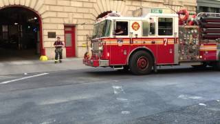 FDNY ENGINE 7 & FDNY TOWER LADDER 1 RETURNING TO QUARTERS ON DUANE ST. IN TRIBECA, MANHATTAN, NYC.