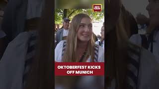 Crowds stream into Oktoberfest grounds as Munich’s iconic beer festival officially opens to revelers