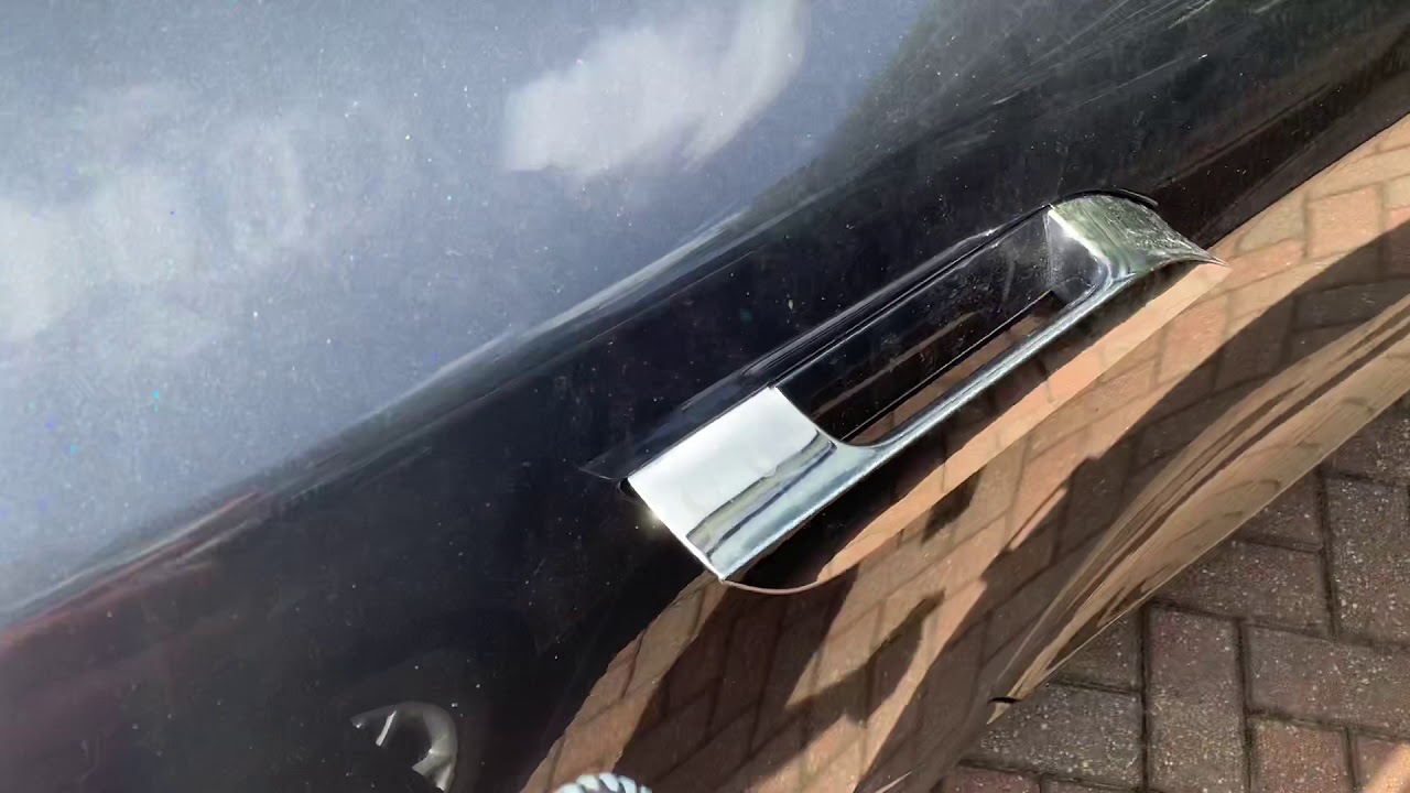Tesla Model S Door handle sticking - simple cause