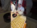 Preparing Chinese Dumplings. Food Festival in Italy