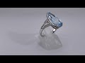 Women&#39;s ring in 14k white gold with topaz and diamonds