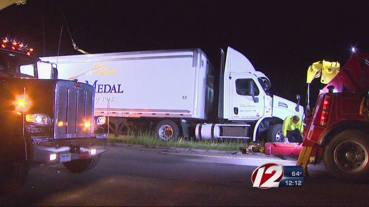 Tractor trailer rolls over onto car on Route 495 - YouTube