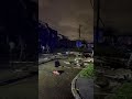 Residents look at tornado damage in near 9th and Derbigny in Gretna