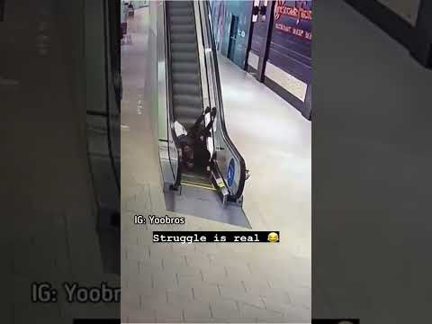 الوقوع من السلم الكهربائي بطريقة مضحكه جدا