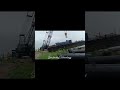 REPOSITIONING A DREDGE PONTOON WITH AN AMERICAN CRAWLER CRANE 9299.