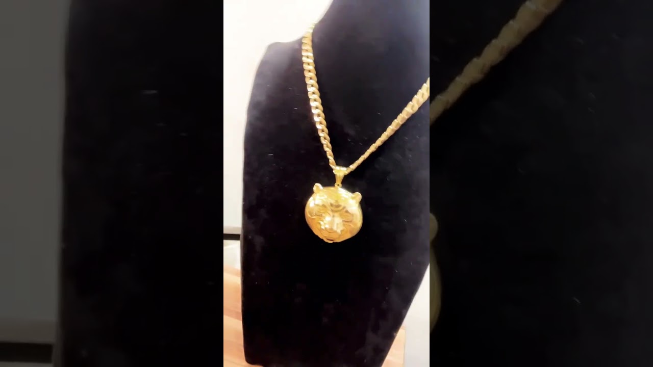 Pure 18 karats chain and lion face pendant 