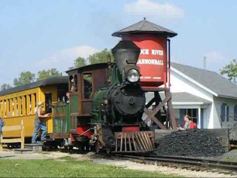 Narrow gauge steam railway at Thresheree Park, Edgerton Wisconsin. A really neat looking, coal burning train. Views include pulling out of station, down into, up from a shallow valley, and back into the station. The Thresheree is held every Labor Day weekend and is a very economical way to give the family ( or yourself ) a dose of steam history. The event host all sorts of steam equipment, and antique gas and diesel, in numerous categories. See this channel for "Steam Powered Saw Mill", "Steam Tractors", "Steam Pile Driver", all on IPFeldspars channel.