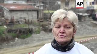 Protest delays planned destruction of scene of 1992-5 war atrocity