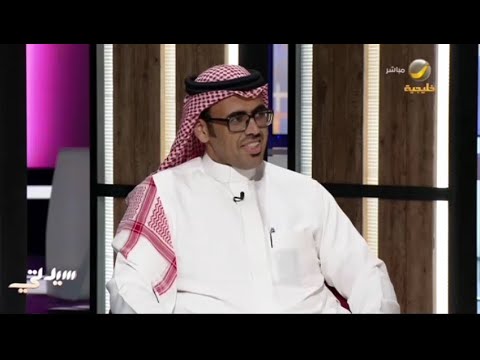 فيديو: البيت ملموسة مرتفعة مع الهندسة المتميزة