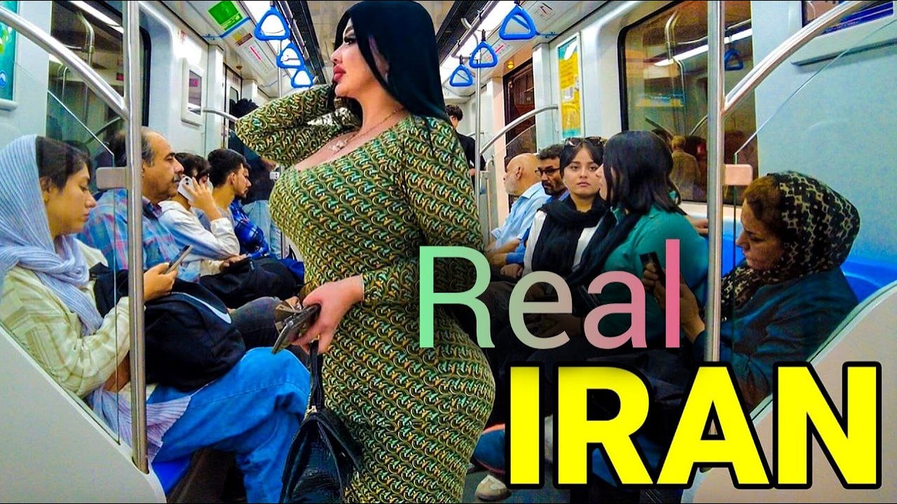 Life in Iran is also going on: real life in a crowded street.