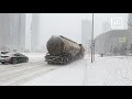 Walking in a snowstorm in a northern Chinese city