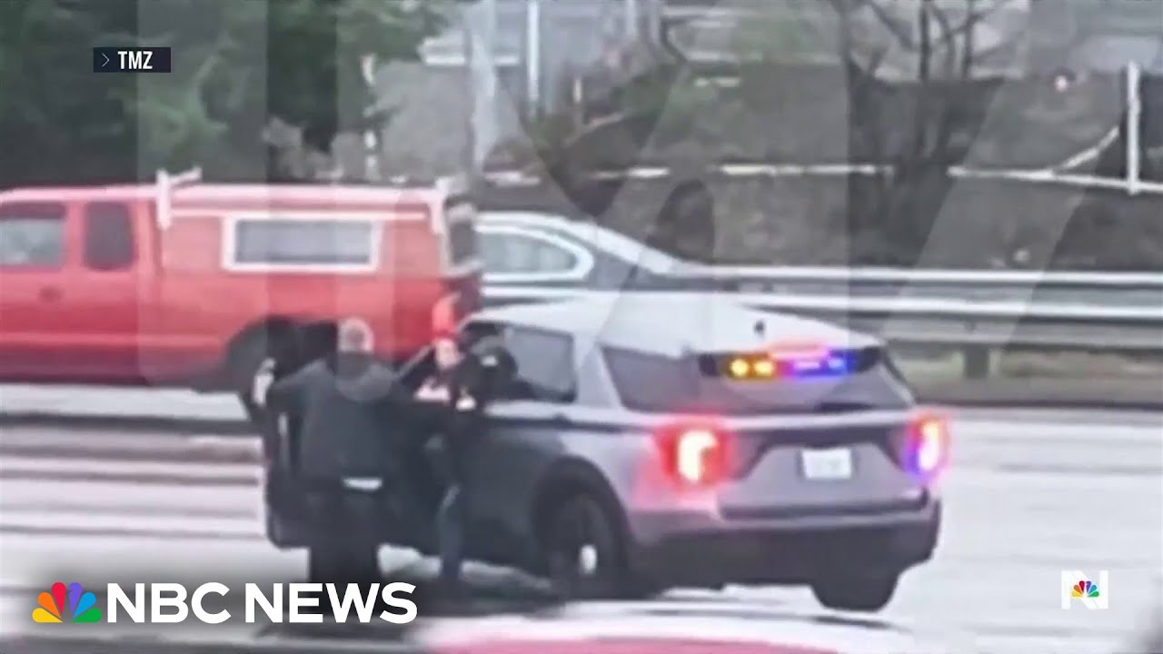 Police in Washington say suspect dragged lieutenant, stole car before chase