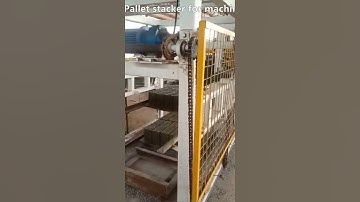 Automatic pallet stacker for concrete block making machine