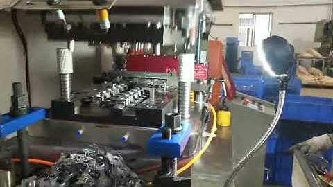 motor bracket stamping progressive die with in die tapping