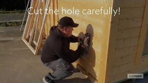 Installing an additional window to Lillevilla city-corner cabin.