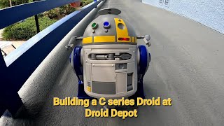 Building a C-series Droid at Droid Depot in Batuu Galaxy's edge Disney world #droiddepot #chopper