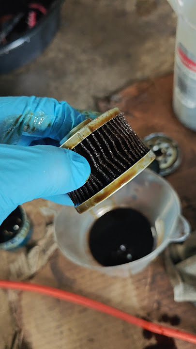 Low oil pressure warning / clogged up oil filter disassembly , inside look #oilfilter #oilpressure