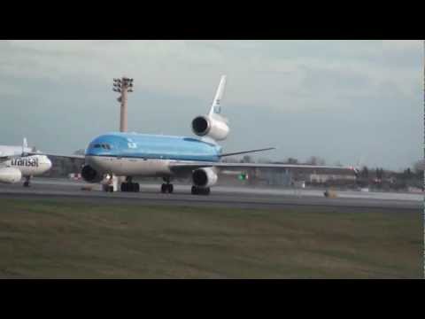 KLM MD-11 waiting for parking spot at very windy Y...