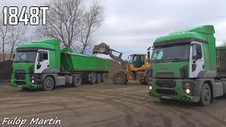 Volvo L60H loading Ford Cargo 1848T