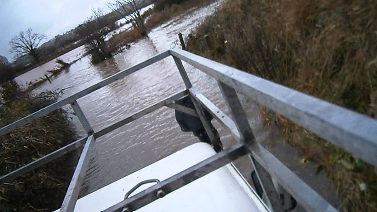 landrover defender in deep water
