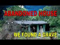 CREEPY OLD HOUSE WITH A GRAVE OUT IN THE YARD