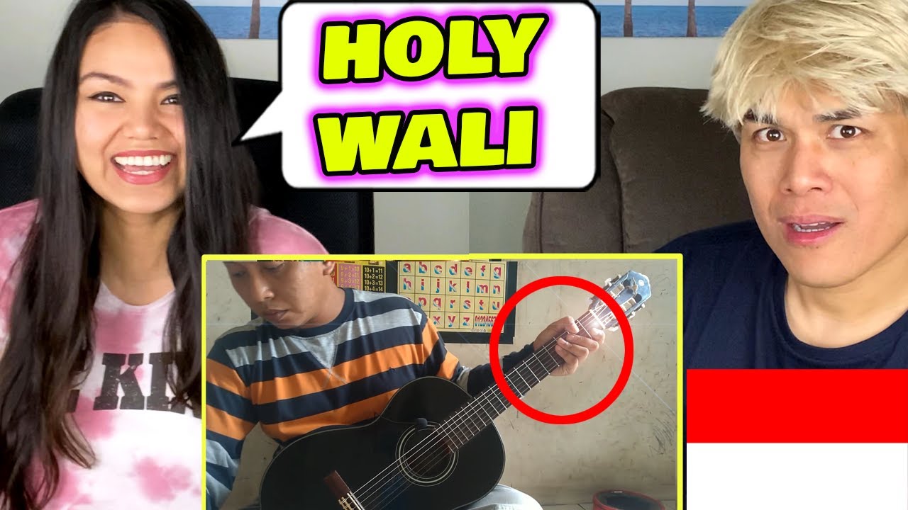 Азиатская пара впервые отреагировала на песню Alip Ba Ta | Wali - Yank (кавер в стиле фингерстайл)