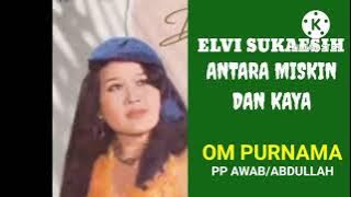 ELVI SUKAESIH  -. ANTARA MISKIN DAN KAYA