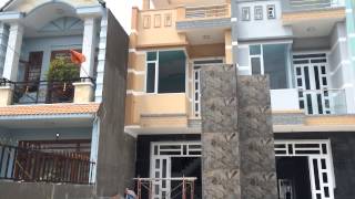 Bán nhà Dĩ An 1 trệt 2 lầu gần chợ , cách đường Trần Hưng Đạo 50m2