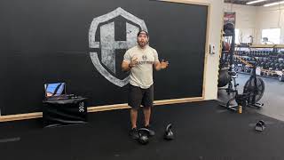 Double Kettlebell Overhead Carry