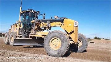 CAT14M motor grader working with Trimble 3D GPS for road construction