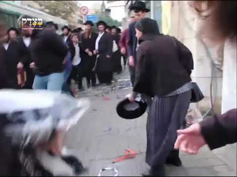 מעצר האלים בידי שוטרי בילוש בהפגנת מחאה נגד חנות סלולר לא כשר בירושלים במהלך המעצר חנקו ותקפו חרדי 