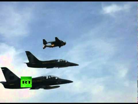 Amazing Video: 'Jet Man' stunts alongside fighter jets over Alps