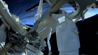 Astronauts conduct spacewalk to improve systems on International Space Station